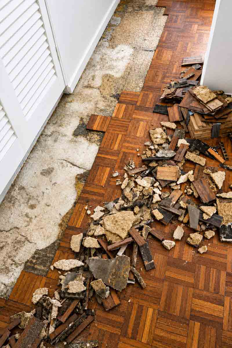 damaged mosaic parquetry floor